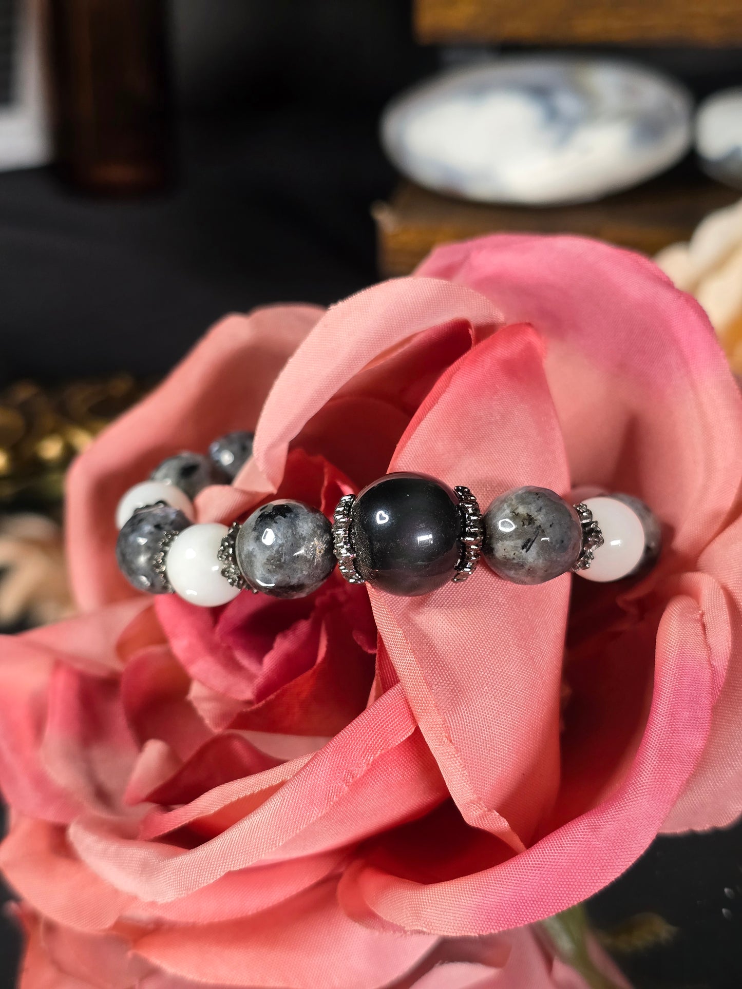 Rainbow Obsidian, White Moonstone, and Larvikite
